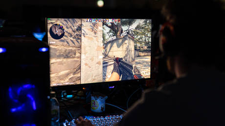 A person plays the video game Counter-Strike: Global Offensive during an esports competition in Hanover, Germany on December 16, 2022.