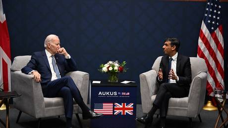 British Prime Minister Rishi Sunak (R) speaks alongside US President Joe Biden during an AUKUS summit in San Diego, California, March 13, 2023