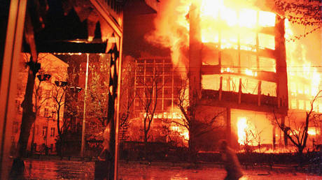 FILE PHOTO. Building ablaze after the NATO bombing on April 2, 1999, Belgrade, Yugoslavia.