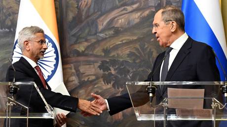 Russian Foreign Minister Sergey Lavrov and Indian Foreign Minister Subrahmanyam Jaishankar shake hands after their meeting in Moscow.