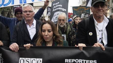 FILE PHOTO: Stella Assange and other supporters of Julian Assange at a protest in London.