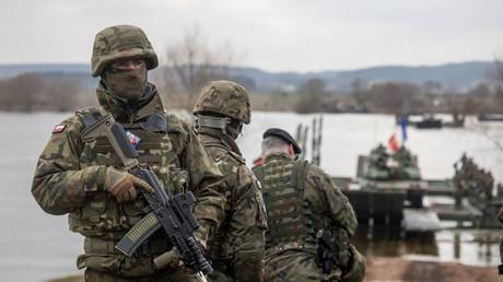 Polish soldiers take part in NATO's Dragon-24 military exercise in Korzeniewo, Poland, March 4, 2024