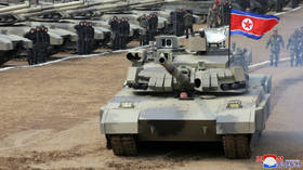 Kim Jong-un drives tank in mock battle – state media