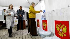 Putin brushes off Western election rebukes