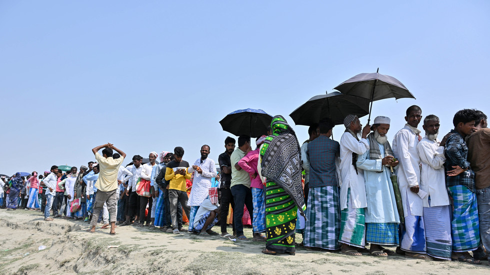 Millions in India brave intense heat to cast their votes