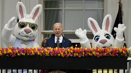 US President Joe Biden addresses guests during the White House Easter Egg Roll in Washington, DC, on April 1, 2024.