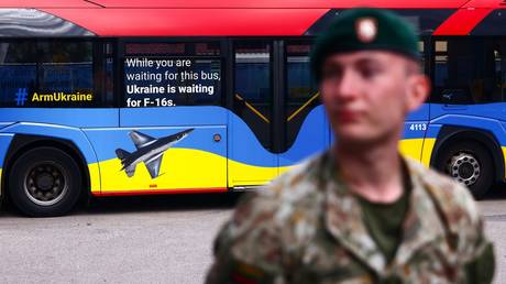 FILE PHOTO: An ad urging the supply of F-16 fighter jets to Ukraine during a NATO summit in Vilnius, Lithuania.