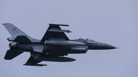 A Belgian F-16 jet fighter takes part in the NATO Air Nuclear drill "Steadfast Noon" at the Kleine-Brogel air base in Belgium on October 18, 2022.