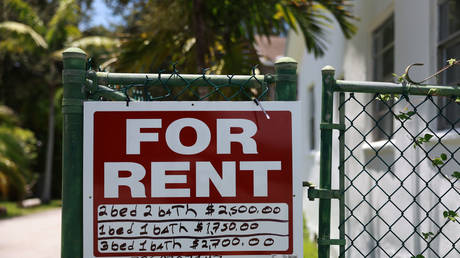 A "for rent" sign is posted last July in Miami, Florida.