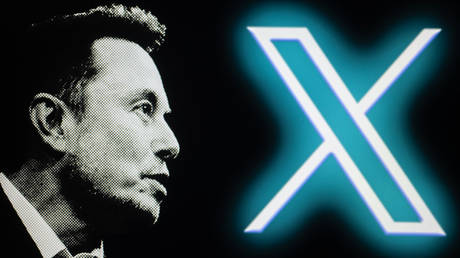 The new Twitter logo, rebranded as X, is being displayed on a screen alongside Elon Musk
