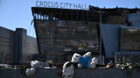 FILE PHOTO: Soft toys and flowers left in front of the Crocus City Hall music venue outside of Moscow in commemoration of the victims of the terrorist attack.