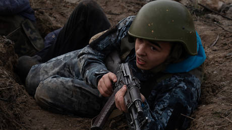 FILE PHOTO.  Ukrainian trainee during combat exercises