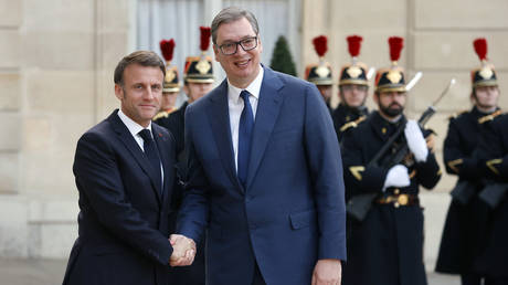 France's President Emmanuel Macron welcomes Serbia's President Aleksandar Vucic at the Elysee Palace, April 8, 2024