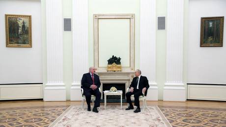 Belarusian President Alexander Lukashenko and Russian President Vladimir Putin attend a meeting at the Kremlin in Moscow, Russia.