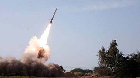 The Iranian Army launches a missile during a military drill at an undisclosed location in southern Iran, January 19, 2024