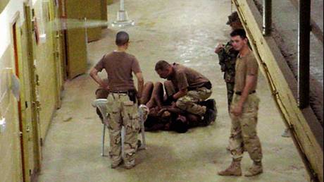A photo published in 2004 purports to show prisoners being abused by US guards at Abu Ghraib prison, near Baghdad.