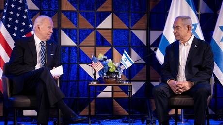 Joe Biden (L) meets with Benjamin Netanyahu in Tel Aviv, Israel, October 18, 2023