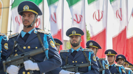 Iranian soldiers take part in a military parade during a ceremony marking the country's annual army day on April 17, 2024 in Tehran, Iran.