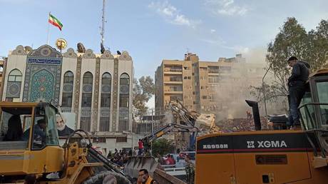 Debris is being cleared away after the Israeli attack on the Iranian consulate in which the commander of the Iranian Islamic Revolutionary Guard Corps (IRGC), Mohammad Reza Zahedi, was killed in Damascus, Syria on April 01, 2024.