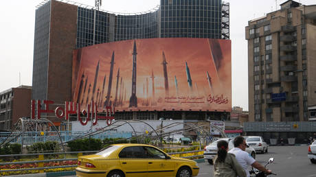 A banner depicting missiles aimed at Israel on April 16, 2024 in Tehran.