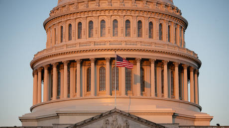 FILE PHOTO: The US Capitol Building and American Flag.