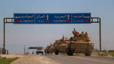 US reinforcements travel in a convoy last August in eastern Syria.