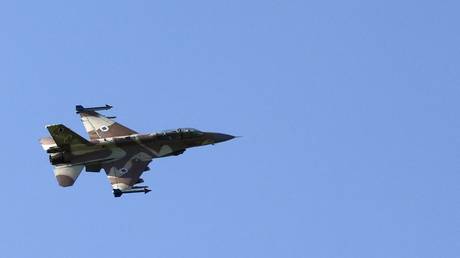 An Israeli Air Force fighter jet flies over the border area with south Lebanon on March 12, 2024