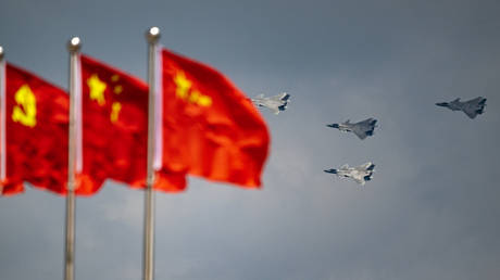 File photo: J-20 stealth fighter jets rehearse for the Changchun Air Show in China, July 24, 2023.