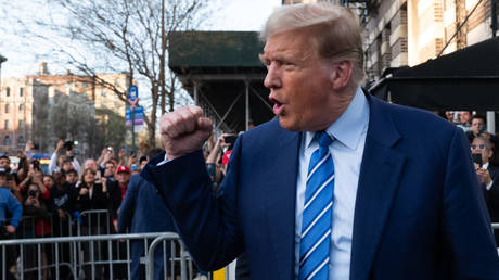 Former US President Donald Trump gestures to supporters earlier this month in New York City.