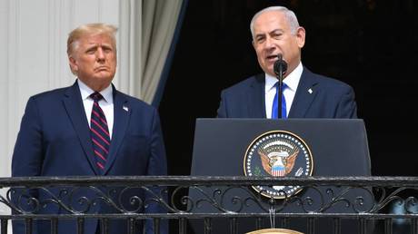 Donald Trump (L) watches as Benjamin Netanyahu speaks at the White House in Washington DC, September 15, 2020