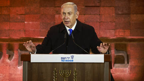 Israel's Prime Minister Benjamin Netanyahu speaks during a ceremony marking Holocaust Remembrance Day for the six million Jews killed during World War II, at the Yad Vashem Holocaust Memorial in Jerusalem on May 5, 2024.