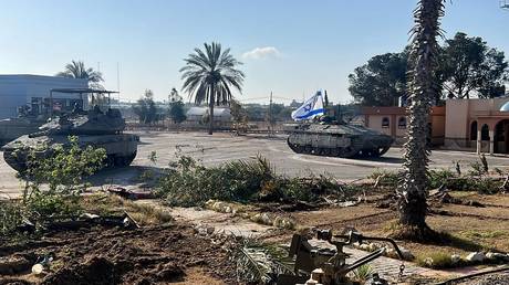 Israeli tanks enter the Palestinian side of the Rafah border crossing in Gaza, May 7, 2024
