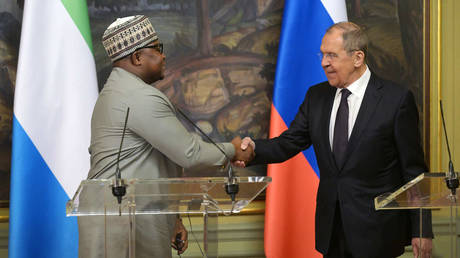 Russian Foreign Minister Sergey Lavrov, right, and his Sierra Leone's counterpart Timothy Musa Kabba shake hands after a joint news conference following their meeting, in Moscow, Russia.