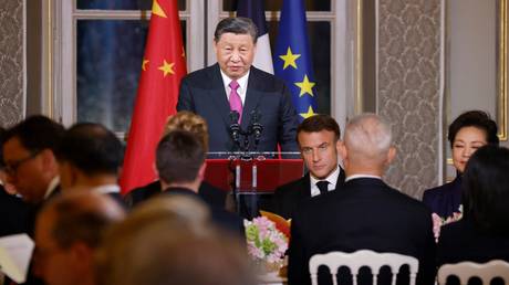 Chinese President Xi Jinping speaks during a toast at an official state dinner as part of the Chinese president's two-day state visit to France, at the Elysee Palace in Paris, on May 6, 2024.