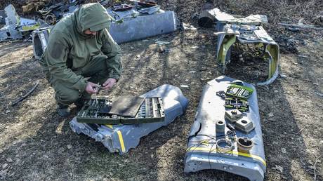 FILE PHOTO: A Russian specialist disassembles an unexploded British-made long-range air-launched cruise missile Storm Shadow used by Ukraine.
