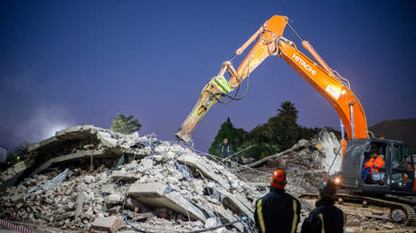 A hammer drill is used during search and rescue operations at the Neo Victoria apartment building in Victoria Street on May 09, 2024 in George, South Africa.