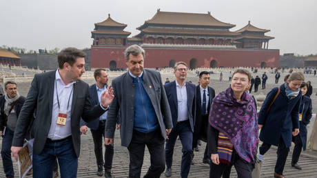 German ambassador to China, Patricia Flor (r), accompanies a German delegation on a visit to the Forbidden City in Beijing on 26 March 2024.