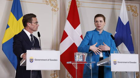 Danish Prime Minister Mette Frederiksen (R) at a joint press conference with other Nordic leaders and German Chancellor Olaf Scholz in Stockholm, Sweden, May 13, 2024.