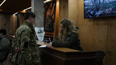  A military officer from the third separate assault brigade is seen doing recruitment job in Kyiv region.