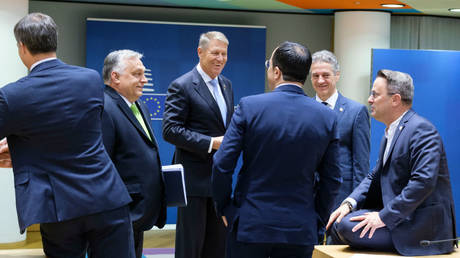 FILE PHOTO: Hungarian Prime Minister Viktor Orban (l) at an EU summit in Brussels, Belgium.