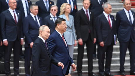Russian President Vladimir Putin attends a welcome ceremony with Chinese President Xi Jinping outside the Great Hall of the People in Beijing, China.