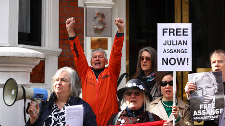 FILE PHOTO. Protesters demand the release of WikiLeaks founder Julian Assange