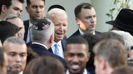 President Joe Biden greets guests after speaking at a Jewish American Heritage Month event on May 20, 2024, in the Rose Garden of the White House in Washington