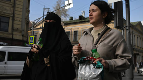 A young woman wearing a niqab in Moscow city center, April 23, 2022