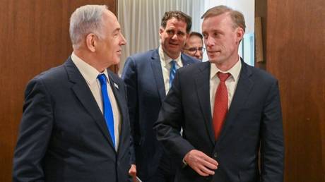 Israeli Prime Minister Benjamin Netanyahu (left) greets US National Security Advisor Jake Sullivan on Sunday in West Jerusalem.