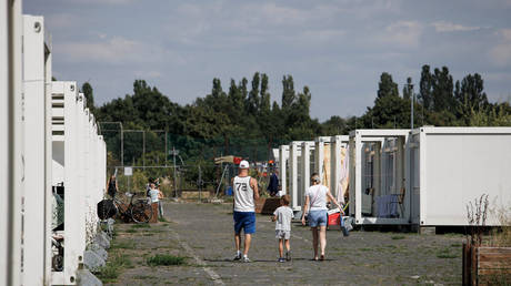 FILE PHOTO: Ukrainian refugees at a container-accommodation center at the former Tempelhof Airport in Berlin, Germany.