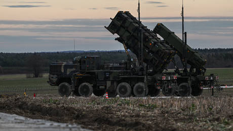 Patriot launchers modules mounted on M983 HEMTT part of the US made MIM-104 Patriot surface-to-air missile (SAM) system are pictured on a open field on February 18, 2023 in Zamosc, Poland.
