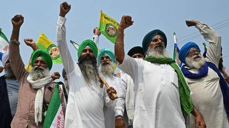 Farmers shout slogans against India's Prime Minister and leader of the ruling Bharatiya Janata Party (BJP) Narendra Modi, during a protest to demand minimum crop prices on the outskirts of Gurdaspur on May 24, 2024.