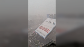 Giant billboard falls on dozens of people in India’s financial capital (VIDEO)
