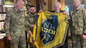 Boris Johnson pictured holding Ukrainian neo-Nazi banner (PHOTO)